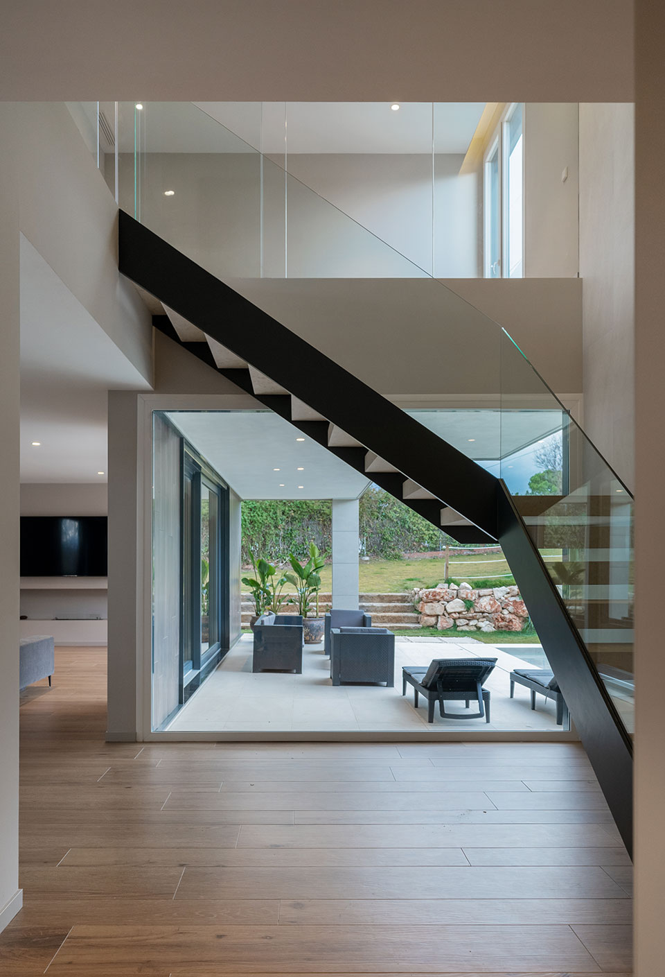 Escalera doble altura. Casa de lujo