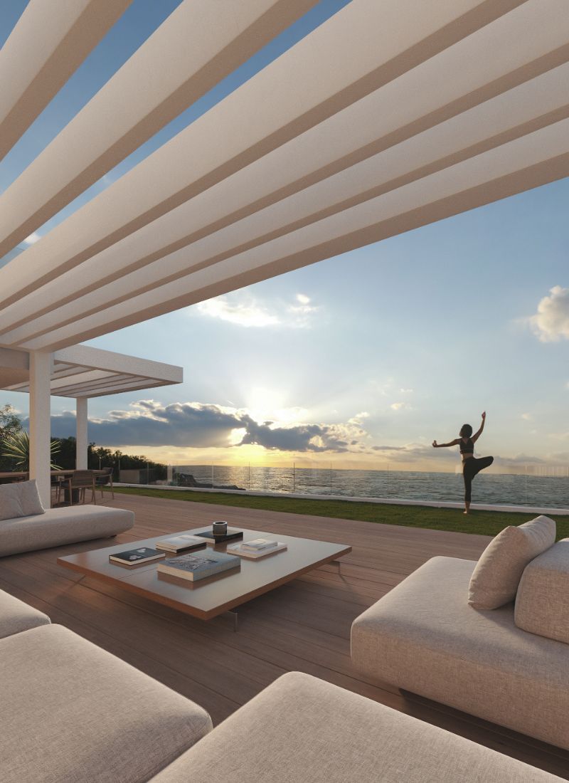 Pérgola exterior en casa veraniega modular con vistas al mar