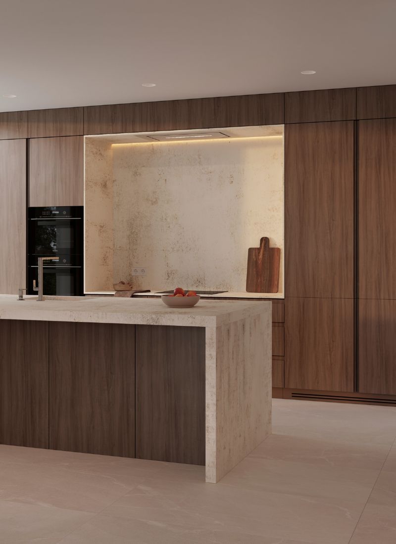 Isla dekton y cocina con muebles de madera dentro de casa modular