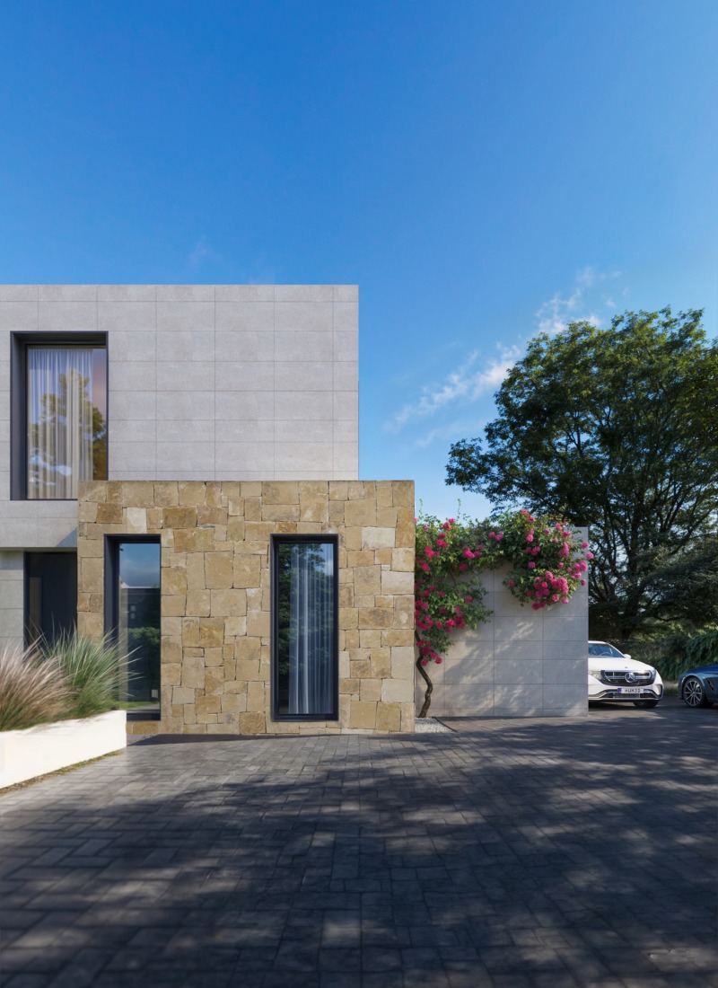 casa industrializada construcción en Barcelona con fachada de piedra